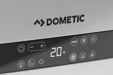 Close-up of Dometic digital control panel for campervan air conditioning system, set to 20°C.