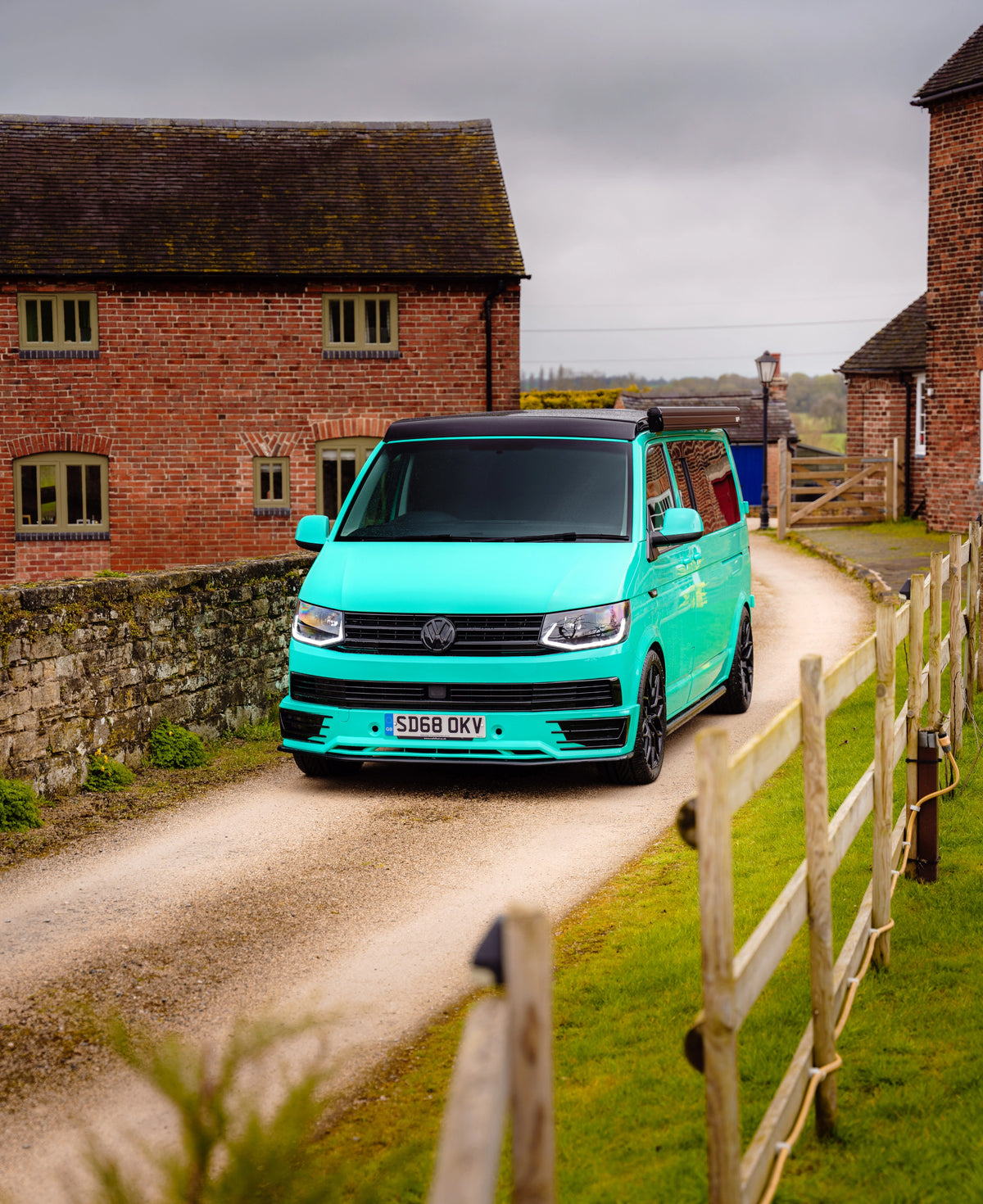 Turquoise Relive campervan on a country lane