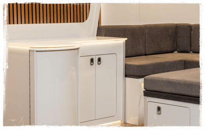 Dirty Rock Montana campervan kitchen with U-shaped seating